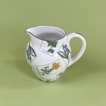 a vintage tiffany & Co pitcher in the strasbourg flowers pattern. 