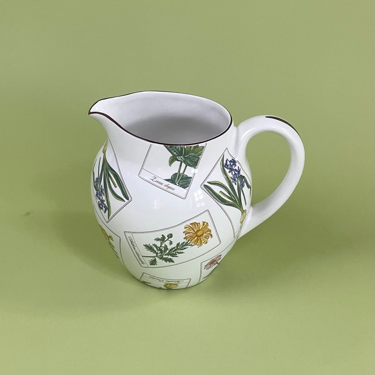 a vintage tiffany & Co pitcher in the strasbourg flowers pattern. 