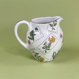 a vintage tiffany & Co pitcher in the strasbourg flowers pattern. 