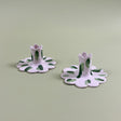 a pair of madcap cottage ceramic candle holders with scalloped edges and a green brushstroke print