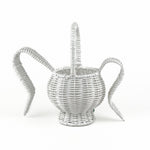back view of white wicker bunny basket with handle on white background