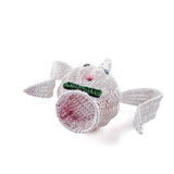 bottom view of white wicker bunny basket with handle on white background