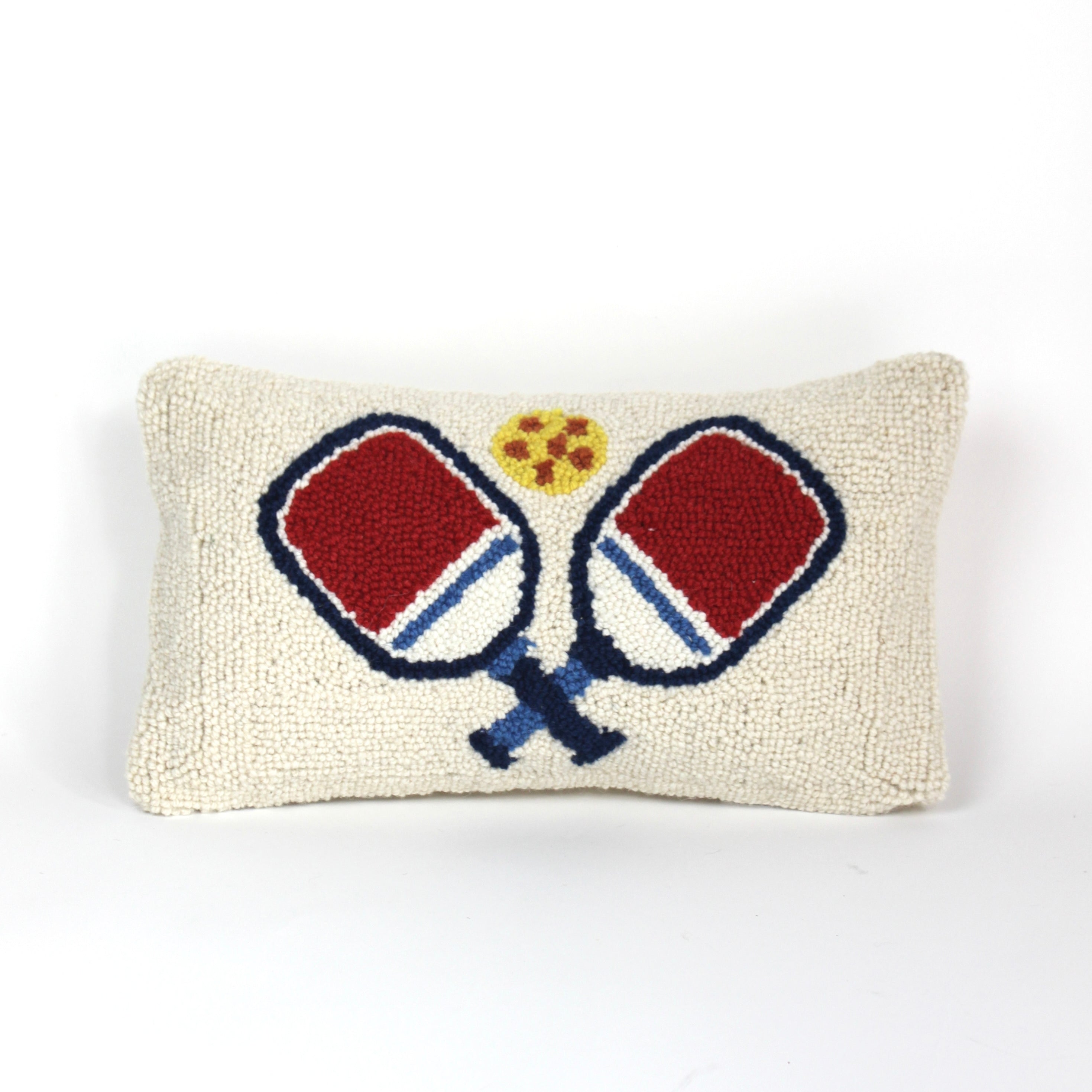 a white pickleball pillow with red paddles from madcap cottage