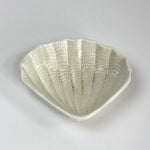 a white ceramic shell plate from madcap cottage