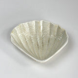 a white ceramic shell plate from madcap cottage