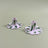 a pair of madcap cottage ceramic candle holders with scalloped edges and a green brushstroke print