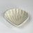 a white ceramic shell plate from madcap cottage