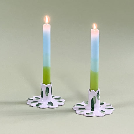 white and green ceramic candle holders