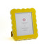 Yellow 8 x 10 scalloped photo frame on a white background