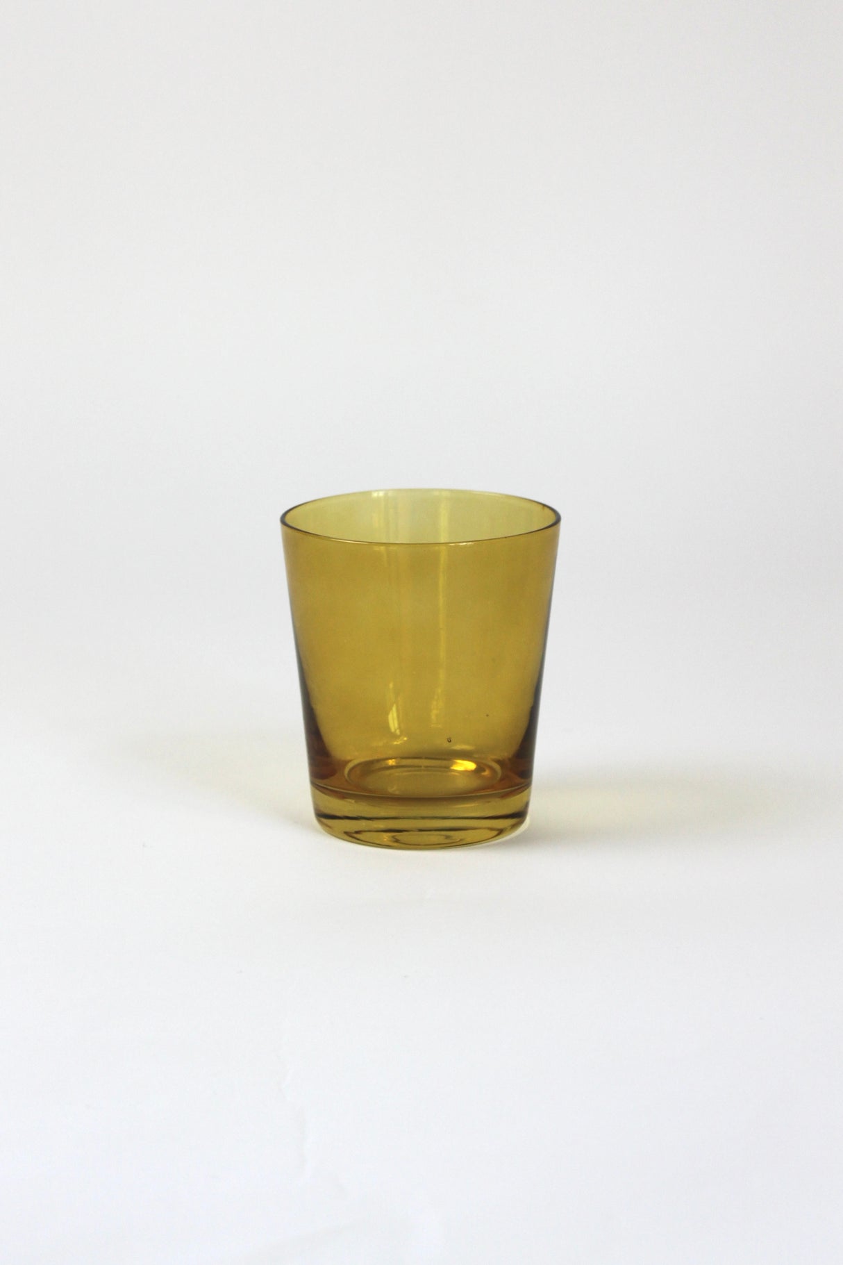 a yellow colored drinking glass from madcap cottage