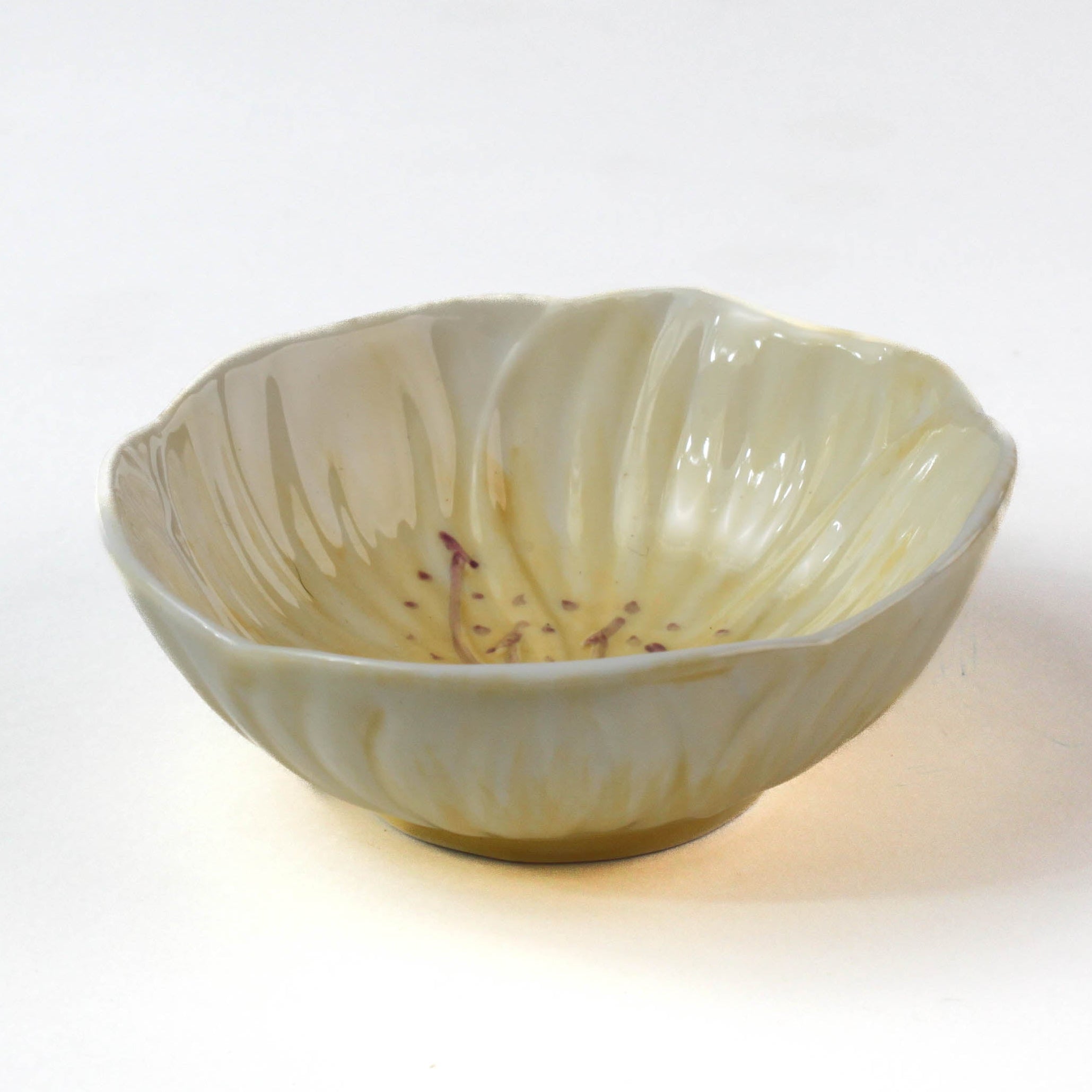 Hand-Painted Yellow Ceramic Flower-Shaped Bowl on a white background