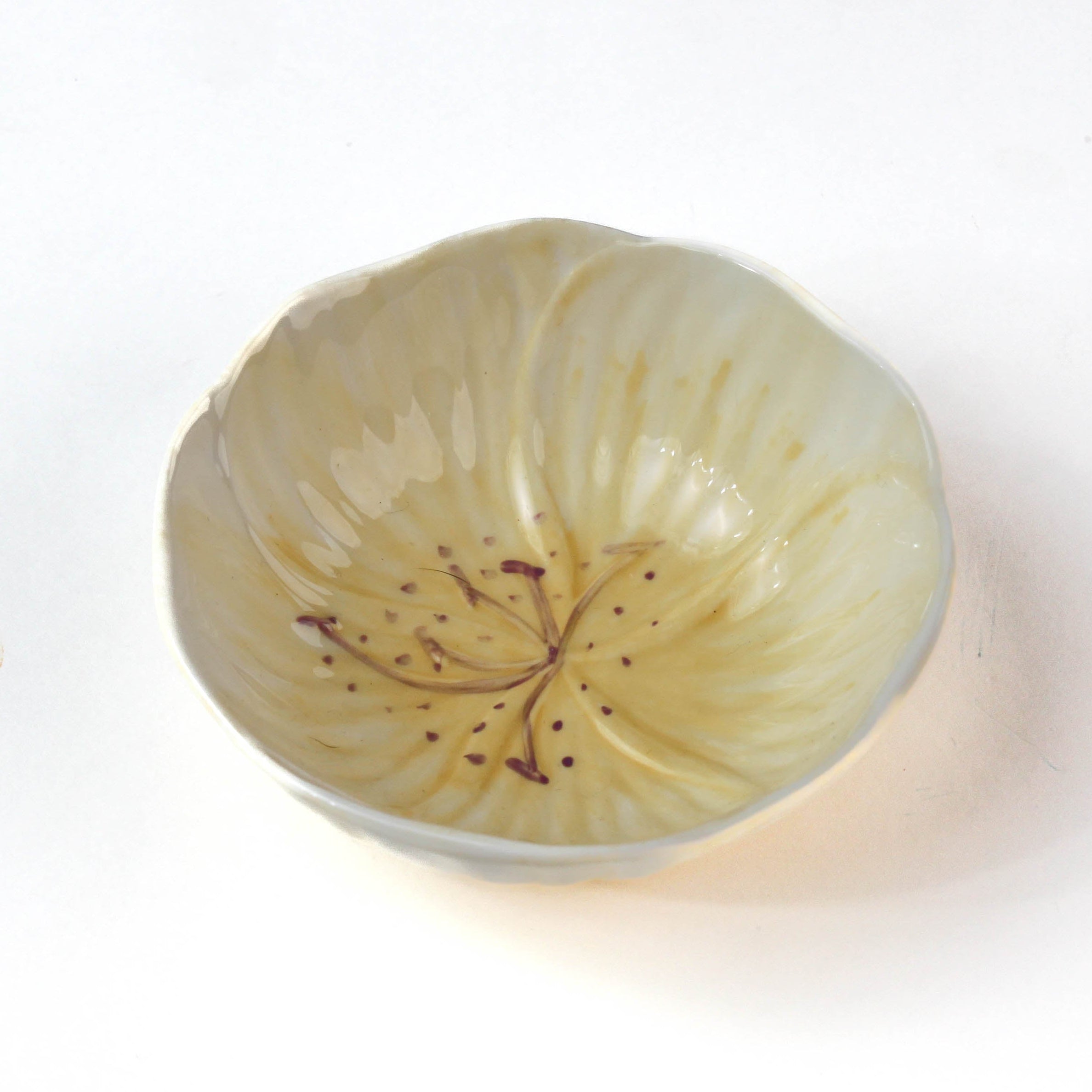 Hand-Painted Yellow Ceramic Flower-Shaped Bowl on a white background