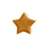 Star-shaped yellow ceramic plate on a white background