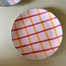 yellow and red ceramic plate