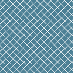 Blue and white fabric in the bahama court trellis pattern from madcap cottage featuring a white trellis on a blue background