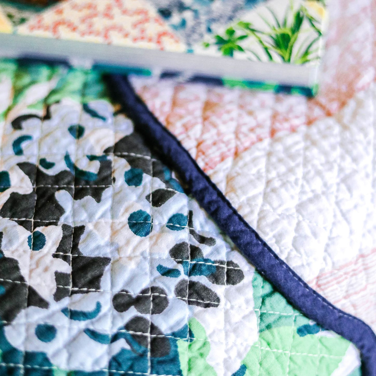 Quilt stitching and welt detail of the Bar Harbor 3pc reversible bed set