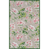 A pink and green rug with a pink, white and green floral pattern on a grey background. 