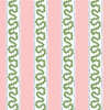 Harbor Trail fabric from Madcap cottage that is a white, green and pink striped fabric featuring a green squiggle motif 