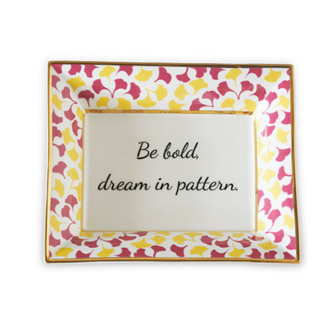 Madcap cottage rhubarb pink and yellow trinket tray with the saying be bold, dream in pattern.