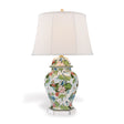 A madcap cottage porcelain buffet lamp covered in waterlily motifs with a plain white lampshade