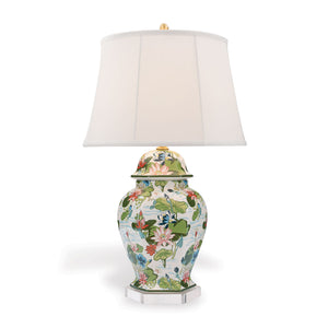 A madcap cottage porcelain buffet lamp covered in waterlily motifs with a plain white lampshade