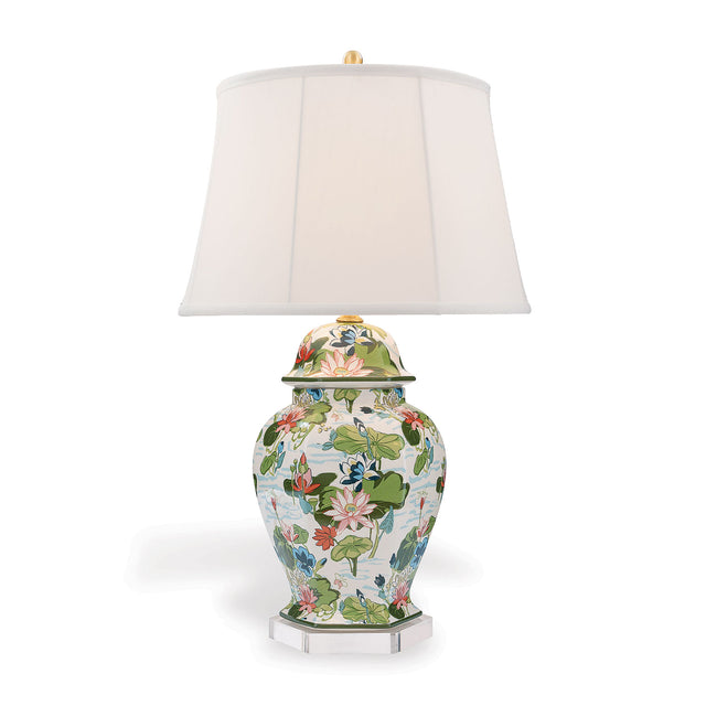A madcap cottage porcelain buffet lamp covered in waterlily motifs with a plain white lampshade