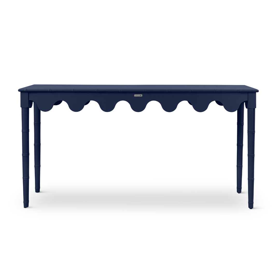a navy blue console table with scalloped edges