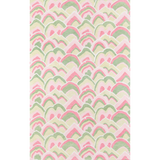 A pink and green rug with a repeating abstract motif