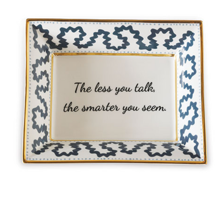 Madcap Cottage blue and white trinket tray with a gold border and a saying that says The less you talk, the smarter you seem. 