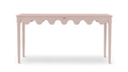 a pink console table with scalloped edges