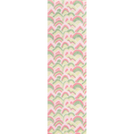 A long rectangular pink and green rug in an abstract print