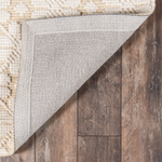 Seville wool yellow patterned flatweave area rug with subtle textured design.