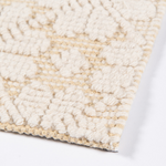 Seville wool yellow patterned flatweave area rug with subtle textured design.