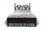 A black faux bamboo bed with chinoiserie bedding from madcap cottage