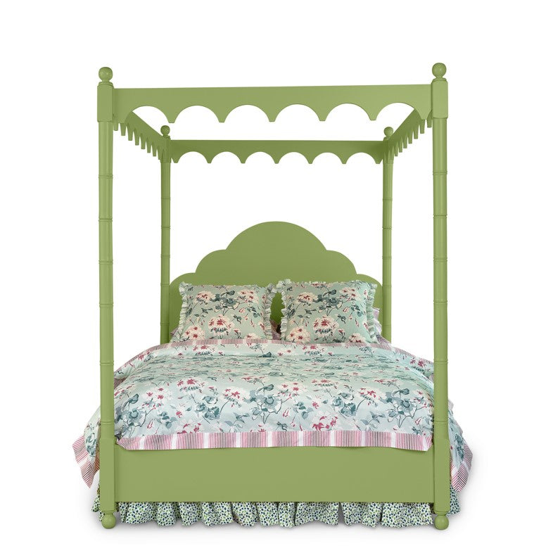 A green four poster canopy bed