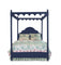 a four poster navy blue canopy bed with floral bedding