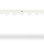 A white console table with scalloped edges