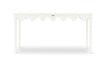 A white console table with scalloped edges