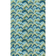a madcap cottage green and blue rug with repeating mountain shape motifs.