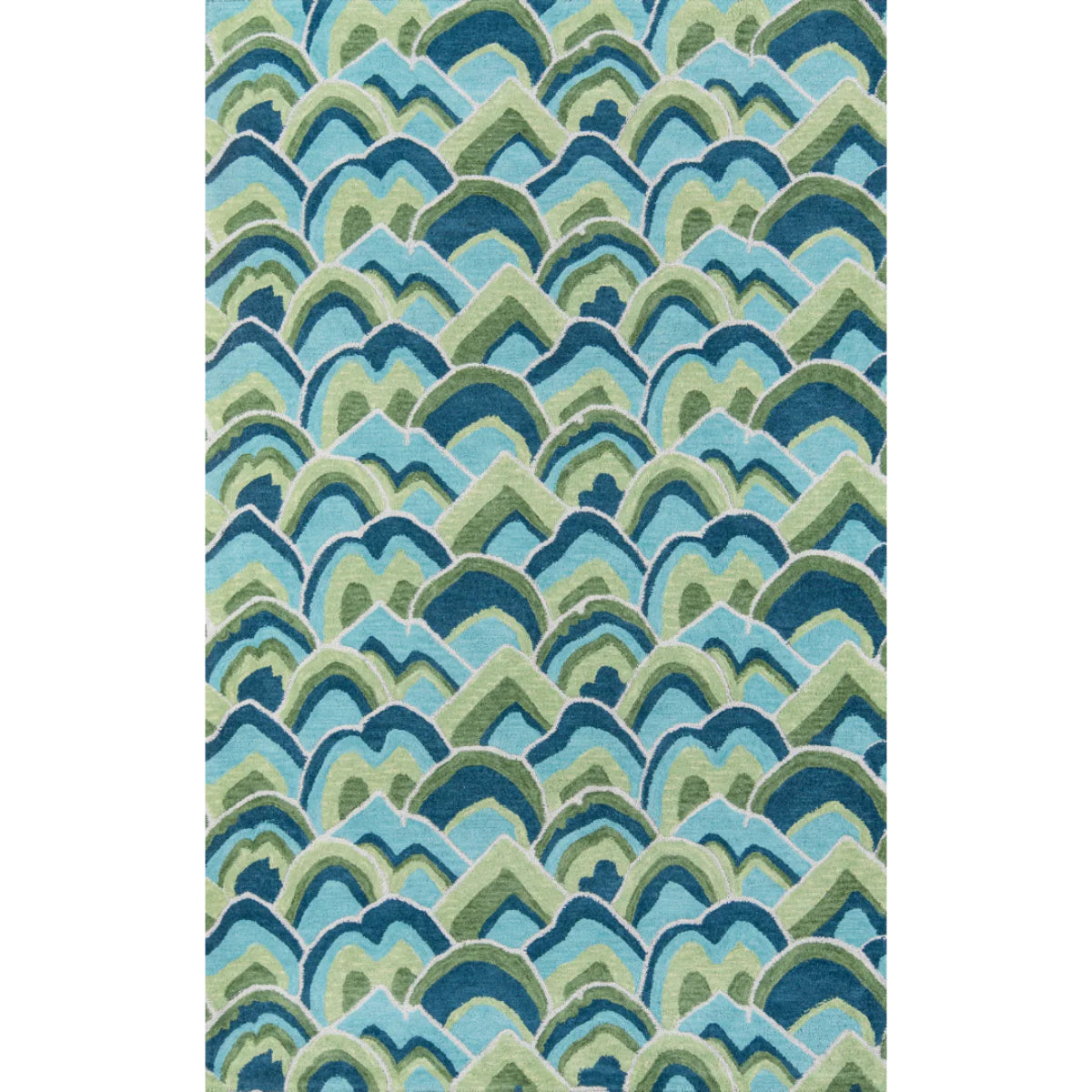 a madcap cottage green and blue rug with repeating mountain shape motifs.