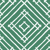 a green and white bamboo trellis fabric called Island House by Madcap Cotttage