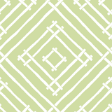 a light green and white bamboo trellis fabric called Island House by Madcap Cotttage