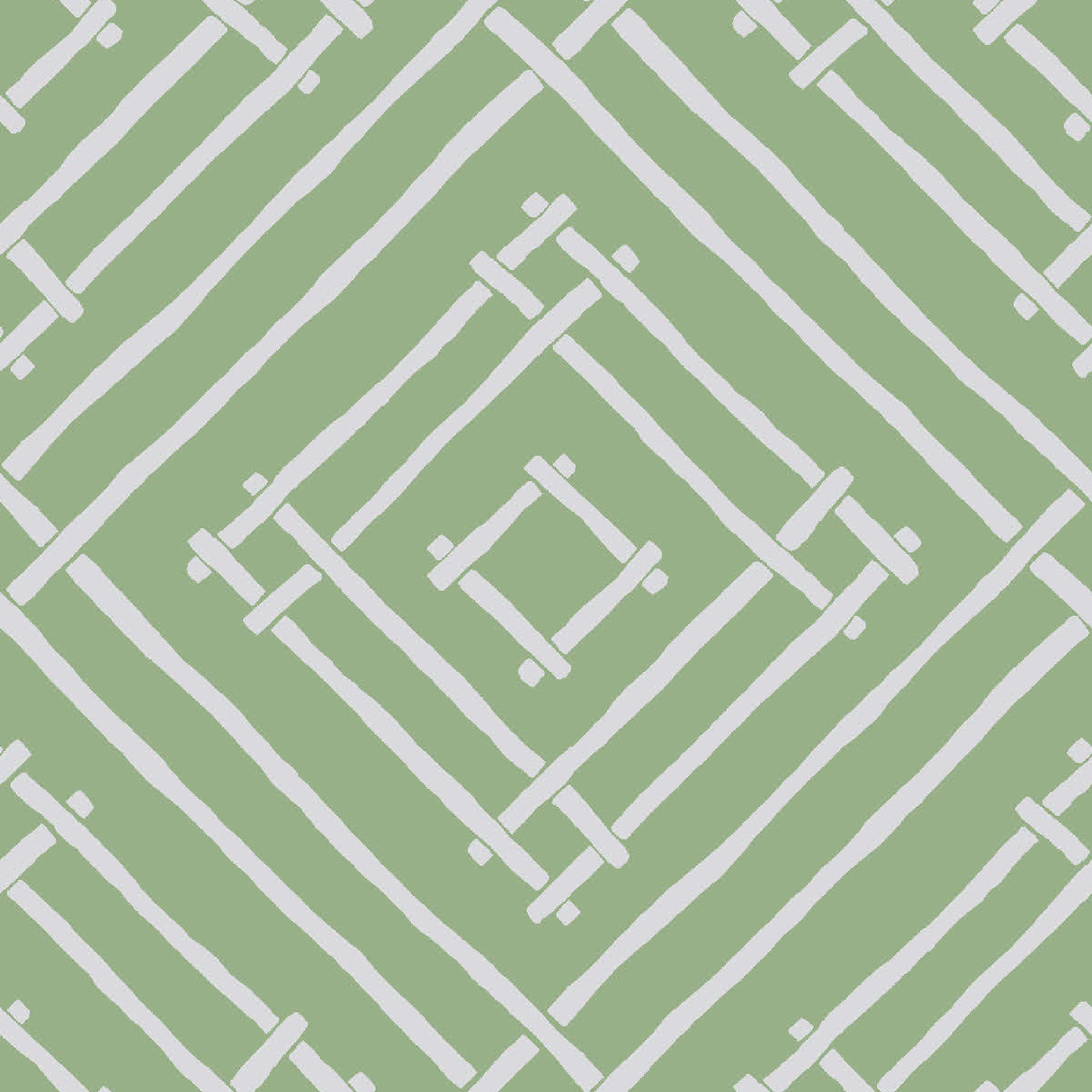 a green and white bamboo trellis fabric called Island House by Madcap Cotttage