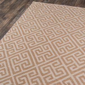 A beige and brown geometric pattern area rug.