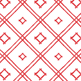a red bamboo trellis fabric on a white background by madcap cottage