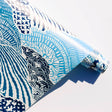 close up of a block print inspired blue peel and stick wallpaper 