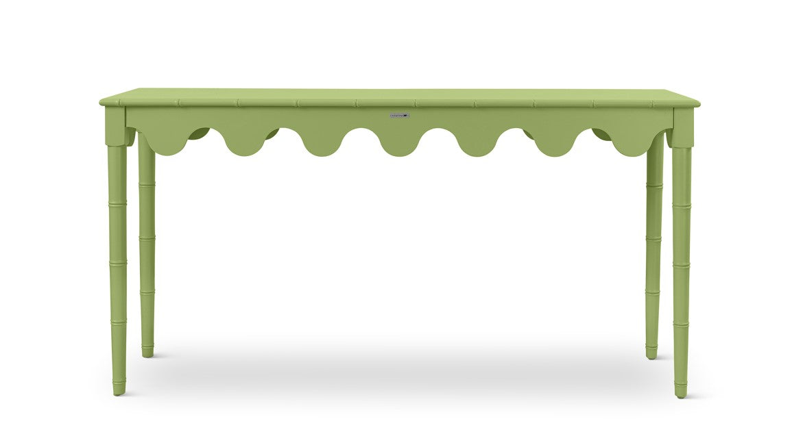 A green console table with scalloped edges