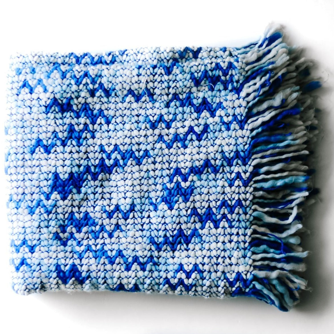 Madcap Knitted Throw Blankets