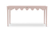 a pink console table with scalloped edges