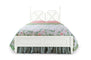 A white faux bamboo bed with chinoiserie bedding from madcap cottage